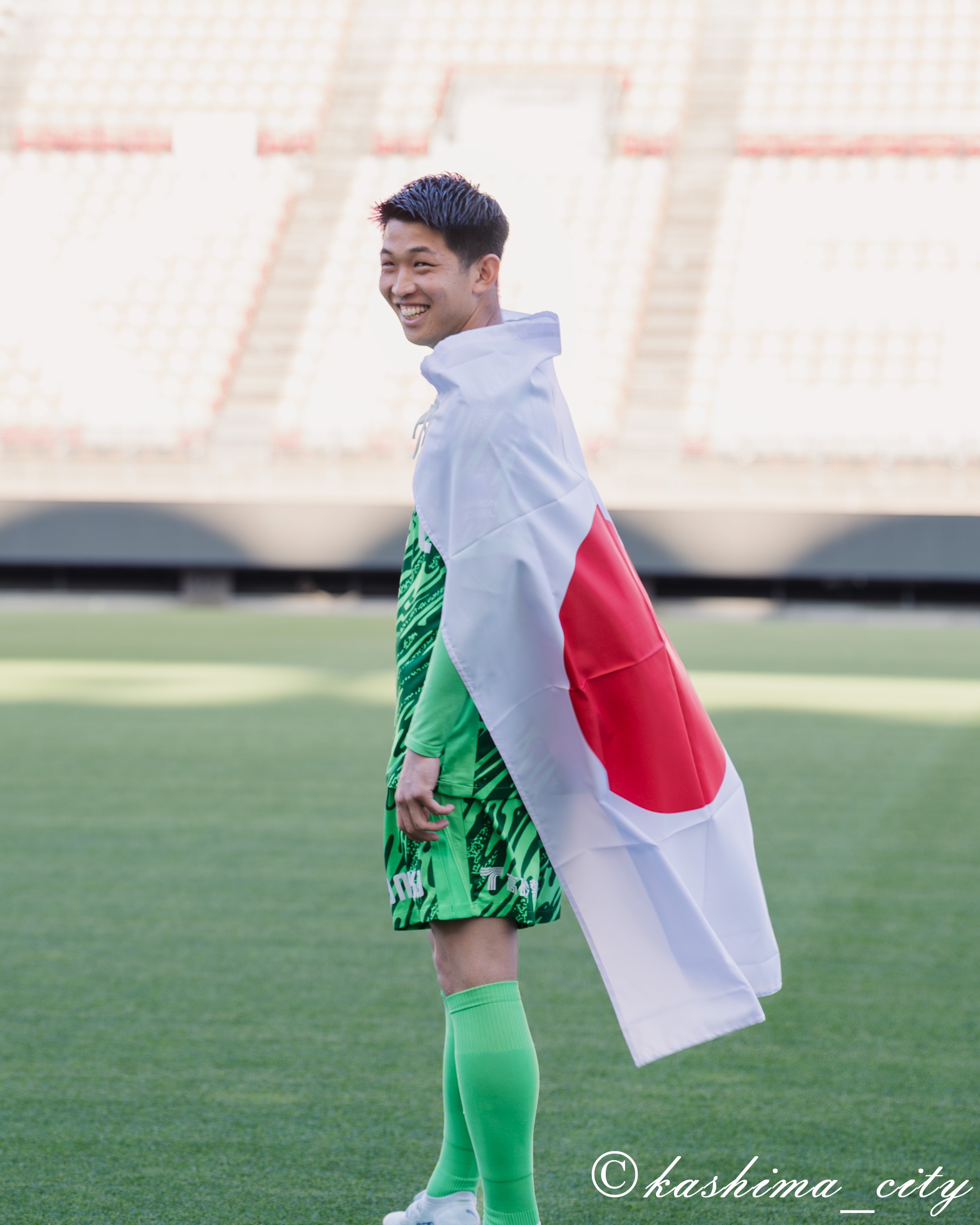 日の丸国旗を背負う早川選手
